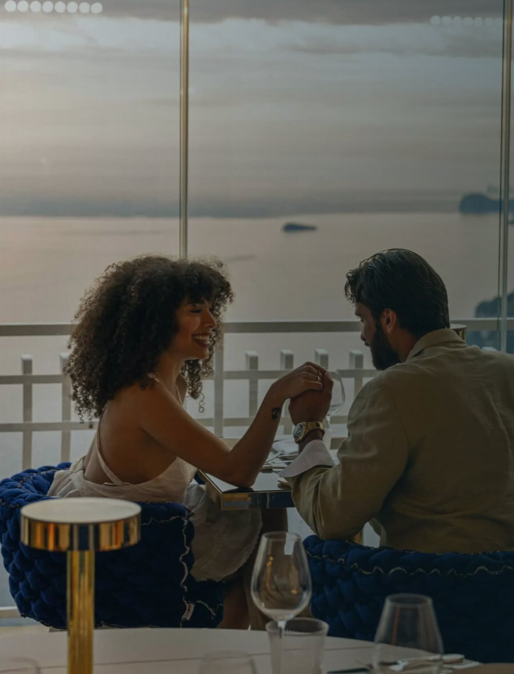 Dinner at a table overlooking the sea