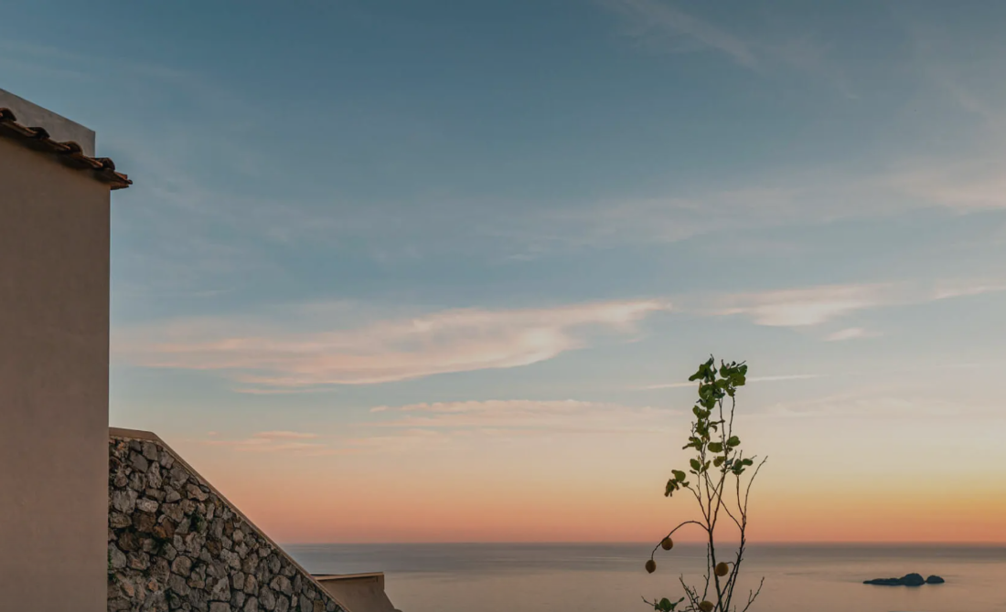 Evening light over the sea from a stone terrace above Positano